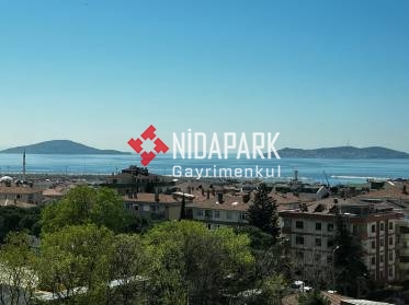 NİDAPARK GAYRİMENKUL'DEN KÜÇÜKYALI KINALI'DA DENİZ MANZARALI 3+1